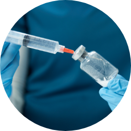 Reconstituting the vial with sterile water for injection image