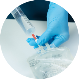 Injecting reconstituted enyzme into infusion bag image